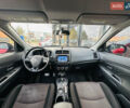 Красный Мицубиси Outlander Sport, объемом двигателя 2 л и пробегом 127 тыс. км за 12499 $, фото 26 на Automoto.ua