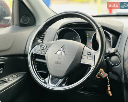 Красный Мицубиси Outlander Sport, объемом двигателя 2 л и пробегом 127 тыс. км за 12499 $, фото 27 на Automoto.ua