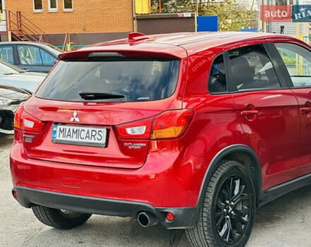 Красный Мицубиси Outlander Sport, объемом двигателя 2 л и пробегом 127 тыс. км за 12499 $, фото 4 на Automoto.ua