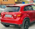 Красный Мицубиси Outlander Sport, объемом двигателя 2 л и пробегом 127 тыс. км за 12499 $, фото 4 на Automoto.ua