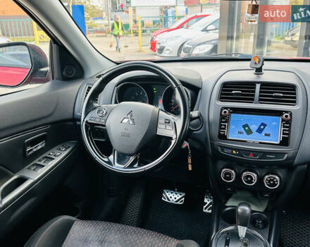 Красный Мицубиси Outlander Sport, объемом двигателя 2 л и пробегом 127 тыс. км за 12499 $, фото 24 на Automoto.ua