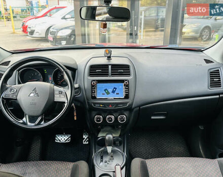 Красный Мицубиси Outlander Sport, объемом двигателя 2 л и пробегом 127 тыс. км за 12499 $, фото 23 на Automoto.ua