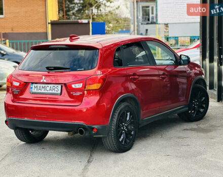 Красный Мицубиси Outlander Sport, объемом двигателя 2 л и пробегом 127 тыс. км за 12499 $, фото 3 на Automoto.ua
