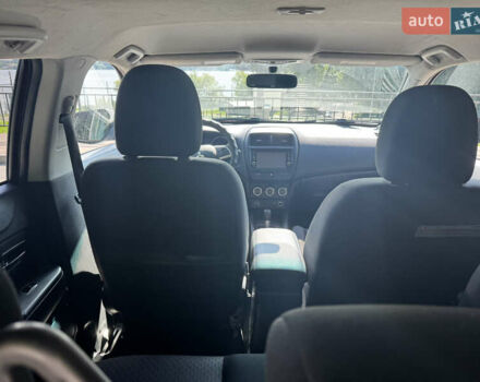 Червоний Міцубісі Outlander Sport, об'ємом двигуна 2 л та пробігом 120 тис. км за 13000 $, фото 3 на Automoto.ua