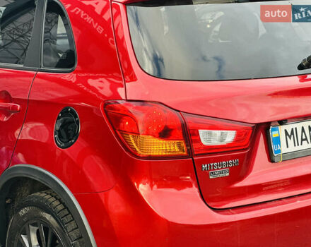 Красный Мицубиси Outlander Sport, объемом двигателя 2 л и пробегом 127 тыс. км за 12499 $, фото 11 на Automoto.ua