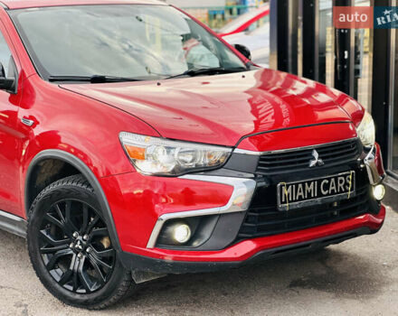 Красный Мицубиси Outlander Sport, объемом двигателя 2 л и пробегом 127 тыс. км за 12499 $, фото 7 на Automoto.ua