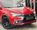 Красный Мицубиси Outlander Sport, объемом двигателя 2 л и пробегом 127 тыс. км за 12499 $, фото 7 на Automoto.ua