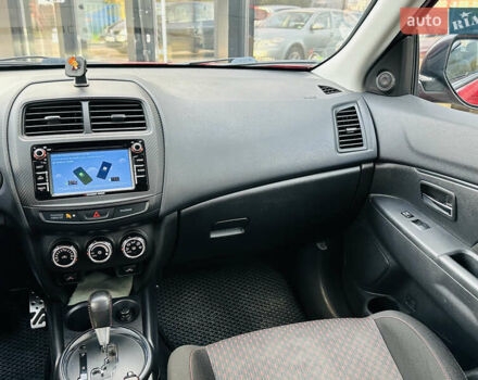 Красный Мицубиси Outlander Sport, объемом двигателя 2 л и пробегом 127 тыс. км за 12499 $, фото 25 на Automoto.ua