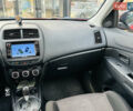 Красный Мицубиси Outlander Sport, объемом двигателя 2 л и пробегом 127 тыс. км за 12499 $, фото 25 на Automoto.ua