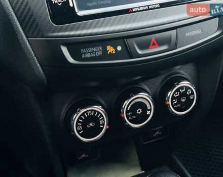 Красный Мицубиси Outlander Sport, объемом двигателя 2 л и пробегом 127 тыс. км за 12499 $, фото 17 на Automoto.ua