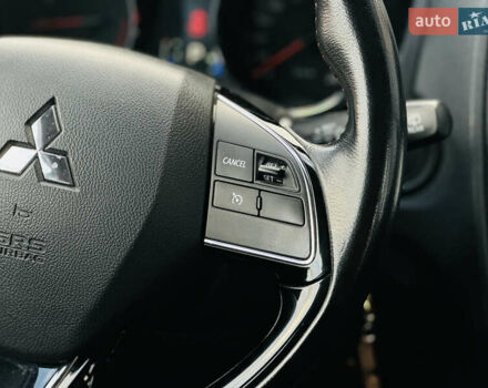 Красный Мицубиси Outlander Sport, объемом двигателя 2 л и пробегом 127 тыс. км за 12499 $, фото 28 на Automoto.ua