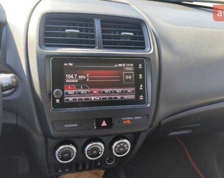 Червоний Міцубісі Outlander Sport, об'ємом двигуна 2.36 л та пробігом 185 тис. км за 13000 $, фото 7 на Automoto.ua