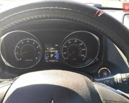 Червоний Міцубісі Outlander Sport, об'ємом двигуна 2.36 л та пробігом 185 тис. км за 13000 $, фото 9 на Automoto.ua