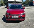 Червоний Міцубісі Outlander Sport, об'ємом двигуна 2.36 л та пробігом 185 тис. км за 13000 $, фото 1 на Automoto.ua