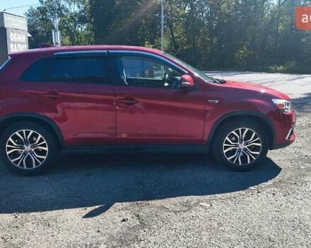 Червоний Міцубісі Outlander Sport, об'ємом двигуна 2.36 л та пробігом 185 тис. км за 13000 $, фото 5 на Automoto.ua