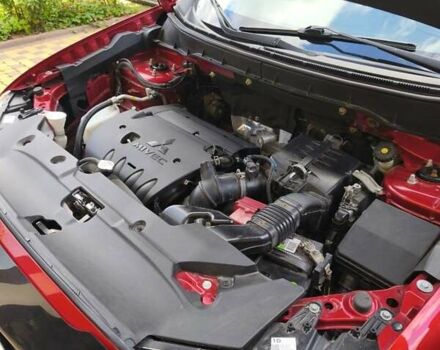 Красный Мицубиси Outlander Sport, объемом двигателя 2 л и пробегом 108 тыс. км за 14900 $, фото 28 на Automoto.ua