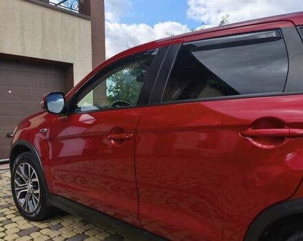 Красный Мицубиси Outlander Sport, объемом двигателя 2 л и пробегом 108 тыс. км за 14900 $, фото 11 на Automoto.ua