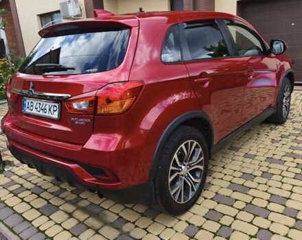 Красный Мицубиси Outlander Sport, объемом двигателя 2 л и пробегом 108 тыс. км за 14900 $, фото 7 на Automoto.ua