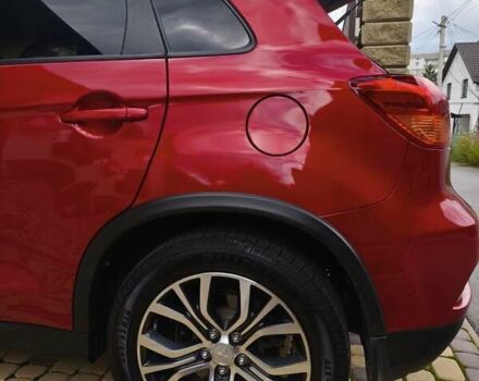 Красный Мицубиси Outlander Sport, объемом двигателя 2 л и пробегом 108 тыс. км за 14900 $, фото 17 на Automoto.ua