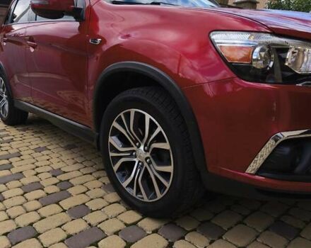 Красный Мицубиси Outlander Sport, объемом двигателя 2 л и пробегом 108 тыс. км за 14900 $, фото 26 на Automoto.ua