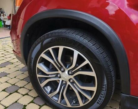 Красный Мицубиси Outlander Sport, объемом двигателя 2 л и пробегом 108 тыс. км за 14900 $, фото 30 на Automoto.ua