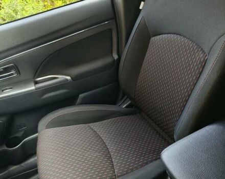 Красный Мицубиси Outlander Sport, объемом двигателя 2 л и пробегом 108 тыс. км за 14900 $, фото 2 на Automoto.ua