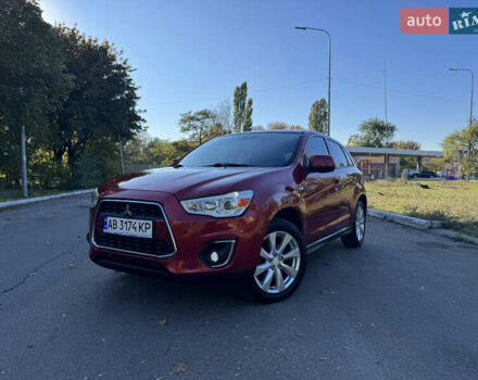 Красный Мицубиси Outlander Sport, объемом двигателя 2 л и пробегом 104 тыс. км за 10600 $, фото 1 на Automoto.ua