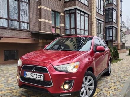 Красный Мицубиси Outlander Sport, объемом двигателя 2 л и пробегом 203 тыс. км за 9250 $, фото 1 на Automoto.ua