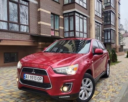 Красный Мицубиси Outlander Sport, объемом двигателя 2 л и пробегом 203 тыс. км за 9250 $, фото 1 на Automoto.ua
