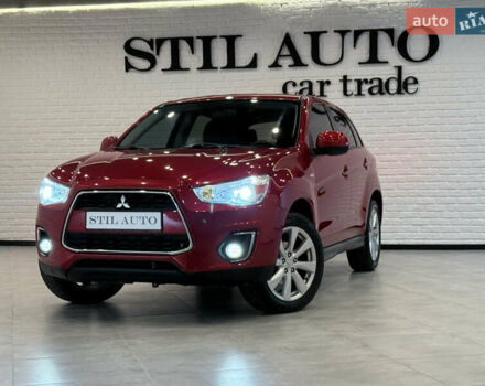 Красный Мицубиси Outlander Sport, объемом двигателя 2 л и пробегом 99 тыс. км за 11999 $, фото 1 на Automoto.ua