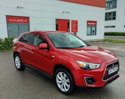 Красный Мицубиси Outlander Sport, объемом двигателя 2 л и пробегом 170 тыс. км за 9700 $, фото 1 на Automoto.ua