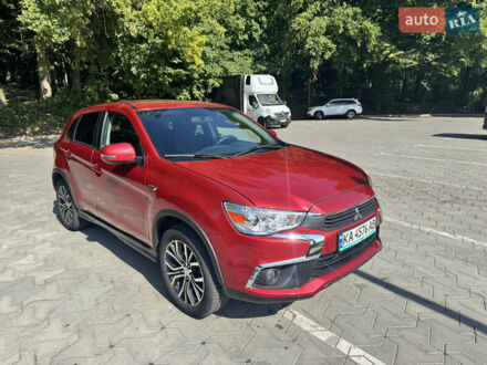 Красный Мицубиси Outlander Sport, объемом двигателя 2 л и пробегом 120 тыс. км за 13000 $, фото 1 на Automoto.ua
