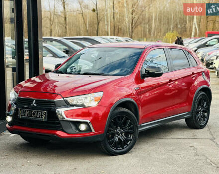 Красный Мицубиси Outlander Sport, объемом двигателя 2 л и пробегом 127 тыс. км за 12499 $, фото 1 на Automoto.ua