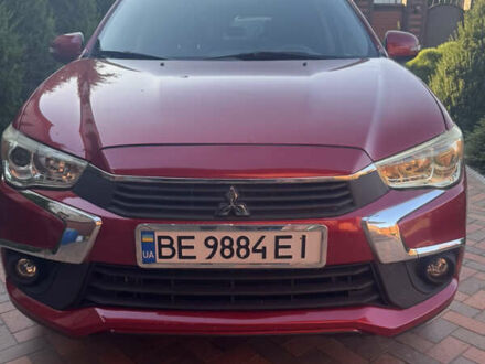 Красный Мицубиси Outlander Sport, объемом двигателя 2 л и пробегом 65 тыс. км за 12500 $, фото 1 на Automoto.ua