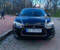 Мицубиси Outlander Sport, объемом двигателя 2 л и пробегом 228 тыс. км за 10800 $, фото 1 на Automoto.ua