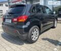 Мицубиси Outlander Sport, объемом двигателя 2 л и пробегом 67 тыс. км за 12700 $, фото 7 на Automoto.ua