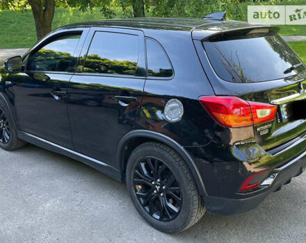 Мицубиси Outlander Sport, объемом двигателя 2 л и пробегом 82 тыс. км за 12600 $, фото 6 на Automoto.ua