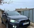 Серый Мицубиси Outlander Sport, объемом двигателя 2.4 л и пробегом 190 тыс. км за 13000 $, фото 1 на Automoto.ua