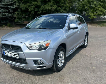 Серый Мицубиси Outlander Sport, объемом двигателя 2 л и пробегом 200 тыс. км за 11200 $, фото 2 на Automoto.ua