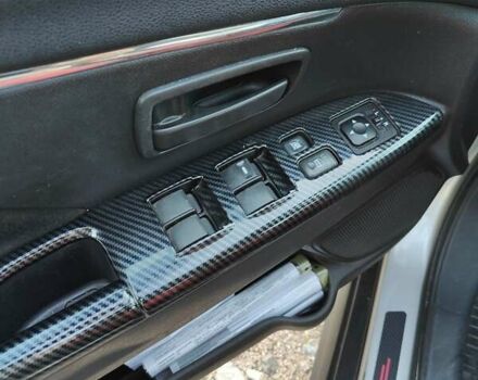 Серый Мицубиси Outlander Sport, объемом двигателя 2 л и пробегом 189 тыс. км за 11200 $, фото 18 на Automoto.ua