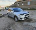 Серый Мицубиси Outlander Sport, объемом двигателя 2 л и пробегом 189 тыс. км за 11200 $, фото 3 на Automoto.ua