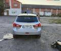 Серый Мицубиси Outlander Sport, объемом двигателя 2 л и пробегом 189 тыс. км за 11200 $, фото 9 на Automoto.ua
