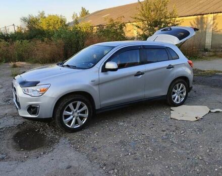 Серый Мицубиси Outlander Sport, объемом двигателя 2 л и пробегом 189 тыс. км за 11200 $, фото 8 на Automoto.ua