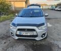 Серый Мицубиси Outlander Sport, объемом двигателя 2 л и пробегом 189 тыс. км за 11200 $, фото 1 на Automoto.ua
