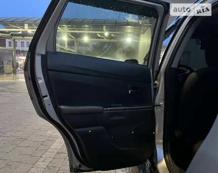 Серый Мицубиси Outlander Sport, объемом двигателя 2 л и пробегом 96 тыс. км за 11000 $, фото 7 на Automoto.ua