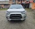 Серый Мицубиси Outlander Sport, объемом двигателя 2 л и пробегом 248 тыс. км за 9999 $, фото 1 на Automoto.ua