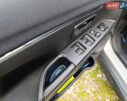 Серый Мицубиси Outlander Sport, объемом двигателя 2 л и пробегом 145 тыс. км за 11200 $, фото 4 на Automoto.ua