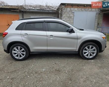 Серый Мицубиси Outlander Sport, объемом двигателя 2 л и пробегом 248 тыс. км за 9999 $, фото 5 на Automoto.ua