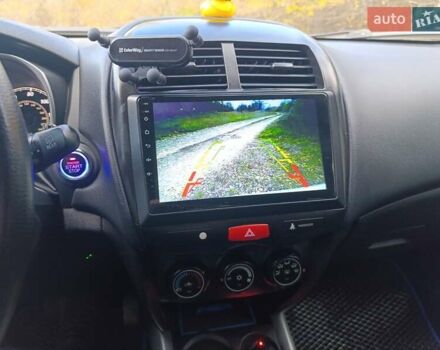 Серый Мицубиси Outlander Sport, объемом двигателя 2 л и пробегом 145 тыс. км за 11200 $, фото 12 на Automoto.ua