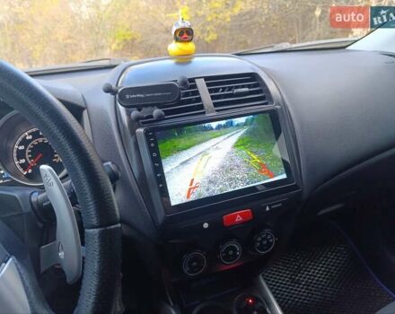 Серый Мицубиси Outlander Sport, объемом двигателя 2 л и пробегом 145 тыс. км за 11200 $, фото 8 на Automoto.ua